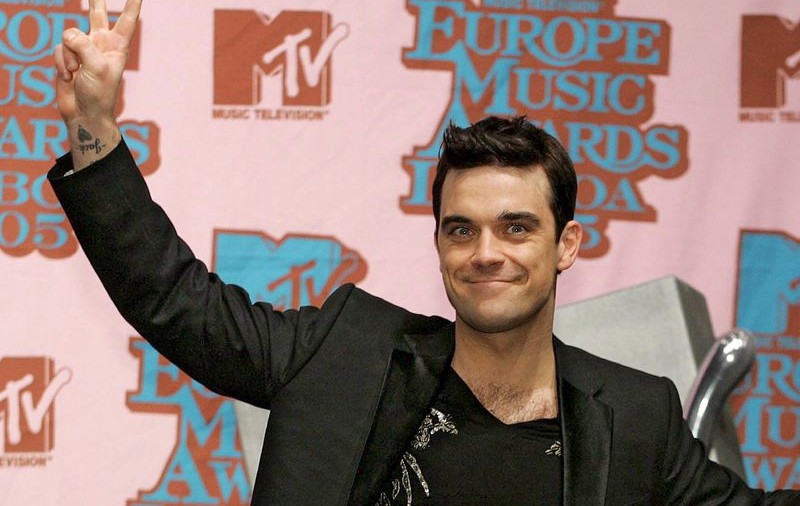 Robbie Williams a negat revenirea în trupa Take That
