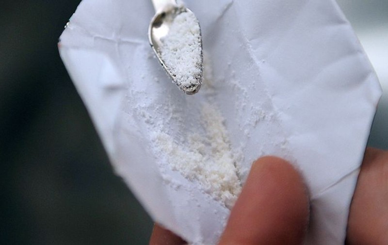 Poliţia i-a înapoiat unei suspecte cocaina confiscată anterior
