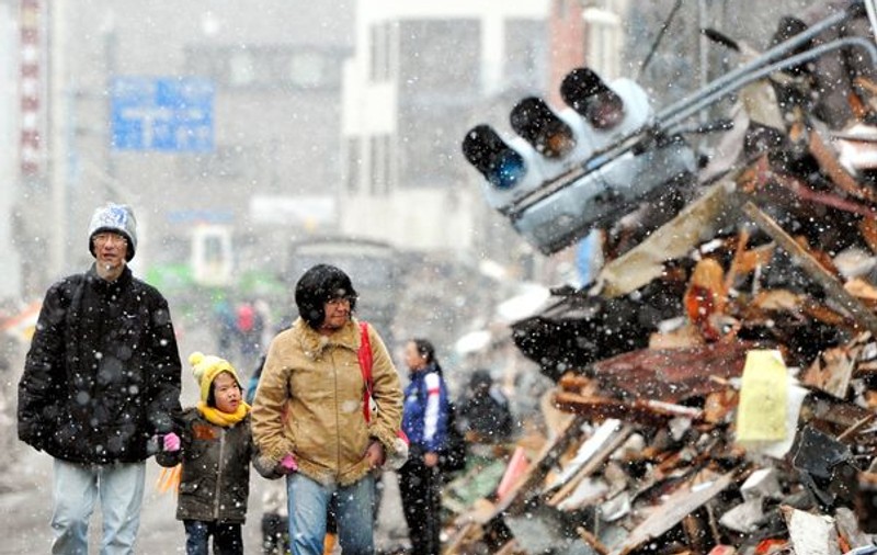 Ninsorile și frigul au pus stăpânire pe regiunile devastate de tsunami, în Japonia