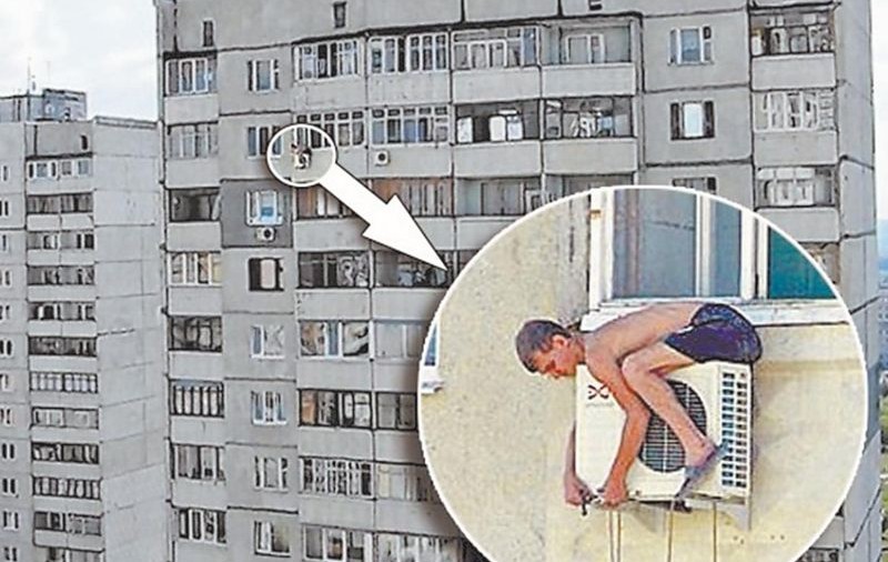 Aşa îşi repară el aerul condiţionat la etajul 16