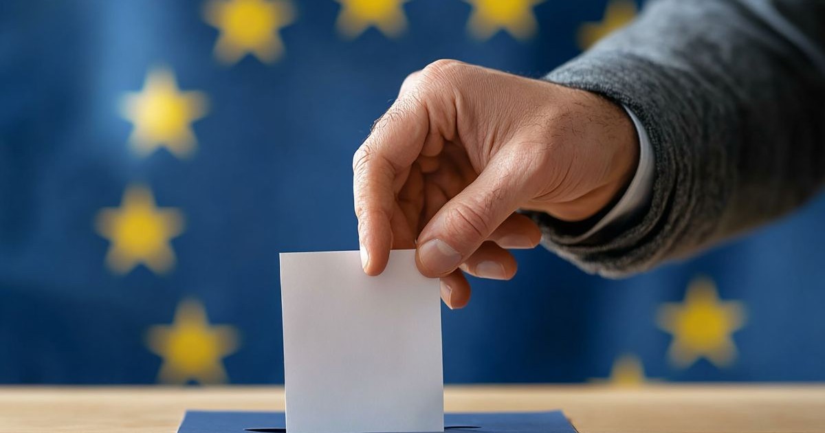 Bărbat punând un vot într-o urnă cu simboluri europene