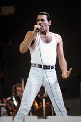July 13, 1985, London, England: FREDDIE MERCURY of QUEEN performing at LIVE AID London at Wembley Stadium. Live Aid is a two-venue benefit concert and music-based fundraising initiative. The event organized by musican British Geldof and Scottish Ure to raise further funds for relief of the 1983–1985 famine in Ethiopia, a movement that started with the release of the successful charity single ''Do They Know It's Christmas?'' in December 1984. Billed as the ''global jukebox'', Live Aid is held simultaneously at Wembley Stadium in London and JFK Stadium in Philadelphia. On the same day, concerts inspired by the initiative are being held in other countries, such as the Soviet Union, Canada, Japan, Yugoslavia, Austria, Australia, and West Germany. It was one of the largest satellite link-ups and television broadcasts of all time. An estimated audience of 1.9 billion people in 150 nations watched the live broadcast, nearly 40 percent of the world population. (Credit Image: © David Plastik/ZUMA Press Wire)
