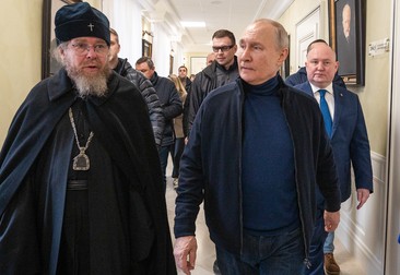 RUSSIA, SEVASTOPOL - MARCH 18, 2023: Russia's President Vladimir Putin (R) and Metropolitan Tikhon Shevkunov, chairman of the Patriarachal Council for Culture, (L) visit a children's arts-and-crafts centre on the ninth anniversary of the reunification of Crimea with Russia. The arts and crafts centre was built by experts of the military construction complex of the Russian Defence Ministry as part of the Chersonesos Taurica historical and archeological park (Credit Image: © Sevastopol Governor Press Servic/TASS via ZUMA Press)