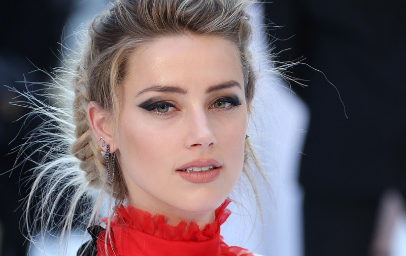 Motivul INCREDIBIL cu care Amber Heard l-a cucerit pe Johnny Depp!