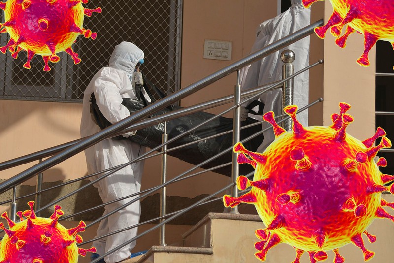 May 3, 2020, Ajmer, Rajasthan, India: (EDITORS NOTE: Image depicts death) Health workers in protective gear prepare the funeral of a coronavirus victim in Ajmer. The death toll related to Covid-19 has reached to 1,301 in India with 39,980 active cases according to the reports. (Credit Image: © Shaukat Ahmed/Pacific Press via ZUMA Wire)