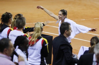 epa05264049 Andrea Petkovic of Germany reacts after defeating Romania's Monica Niculescu during the Fed Cup World Group play-off tie between Romania and Germany in Cluj city, 450Km north-west from Bucharest, Romania, 17 April 2016. EPA/SIMION SEBASTIAN TATARU