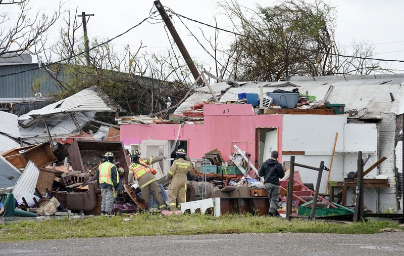 FOTO | Ce a lăsat uraganul Harvey în urmă. Oamenii dintr-un orășel au fost îndemnați să-și scrie numele pe braț