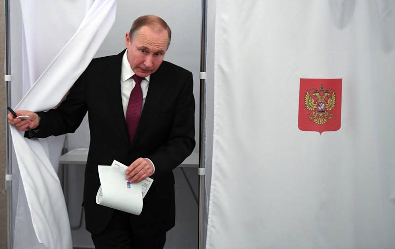 FOTO /  Vladimir Putin, la secția de votare: "Sunt mulțumit cu orice procent"