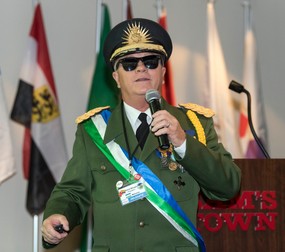 August 06, 2022 - Las Vegas, Nevada, USA - President KEVIN BAUGH of the Republic of Molossia speaks at MicroCon, the semi-annual gathering of government officials and dignitaries from self-proclaimed, fanciful micronations from around the world. Though their sovereignty may not recognized by larger countries, and they may not even exist anywhere but in the imaginations of their founders, these micronations and their small number of ''citizens'' will generally have the trappings of larger nations: laws, national flags, passports, currencies, stamps, national anthems and diplomatic relations with other micronations, etc.,Image: 712506755, License: Rights-managed, Restrictions: , Model Release: no