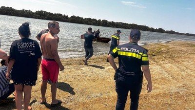 familie-luata-ape-dunare-giurgiu-ofiteri-politie-plaja-neamenajata