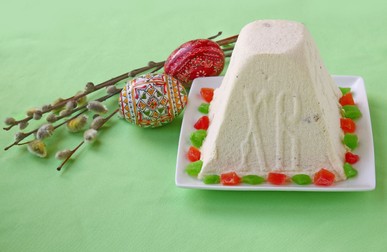 22000588 - curd paskha (pacha) , easter eggs and bunch of willow branches on a green background