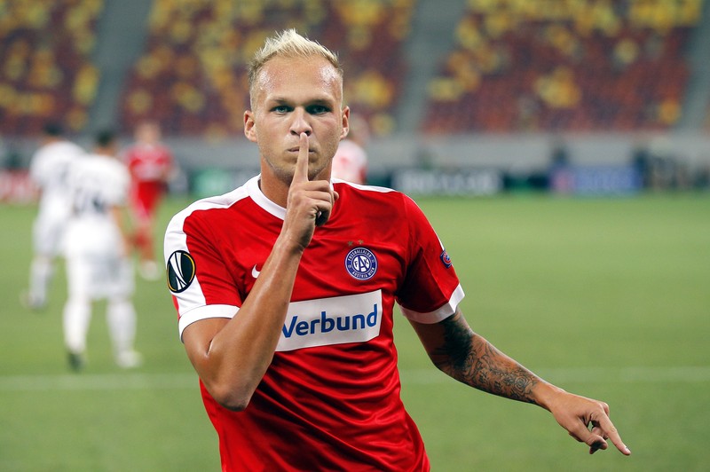 epa05541118 Austria Vienna's Raphael Holzhauser reacts after scoring the opening goal from the penalty spot during the UEFA Europa League group E soccer match between Astra Giurgiu and Austria Vienna in Bucharest, Romania, 15 September 2016. EPA/ROBERT GHEMENT
