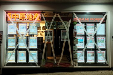 September 5, 2024, Hong Kong, China: Staffs put up tapes on glass doors and windows during Yagi approaches Hong Kong. Yagi intensified into a super typhoon and is expected to be closest to the city by Friday morning, with the first No. 8 signal of the year in effect.,Image: 905020336, License: Rights-managed, Restrictions: , Model Release: no