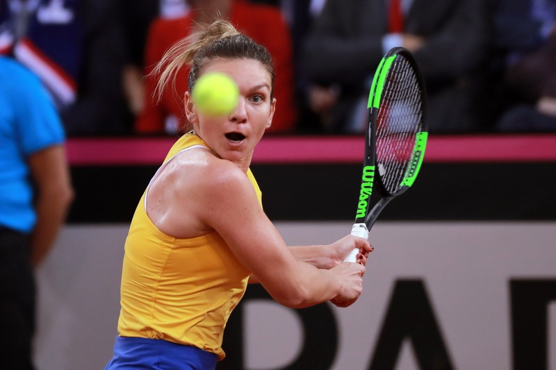 epa07517625 Simona Halep of Romania in action during her game against Kristina Mladenovic of France during the Fed Cup World Group, Semi Final between France and Romania, in Rouen, France, 20 April 2019. EPA-EFE/CHRISTOPHE PETIT TESSON