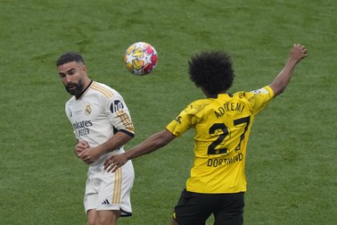 Dortmund's Karim Adeyemi, right, heads the ball past Real Madrid's Dani Carvajal during the Champions League final soccer match between Borussia Dortmund and Real Madrid at Wembley stadium in London, Saturday, June 1, 2024.,Image: 878166399, License: Rights-managed, Restrictions: This content is intended for editorial use only. For other uses, additional clearances may be required., Model Release: no, Pictured: Daniel Carvajal,Karim Adeyemi