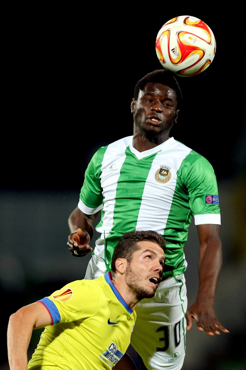 epa04479558 Rio Ave's Alhassan Wakaso (R) in action against Russian Lucian Filip of Steua Bucaresti during their Europa League soccer match, held at Arcos stadium, Vila do Conde, Portugal, 06 November 2014. EPA/JOSE COELHO