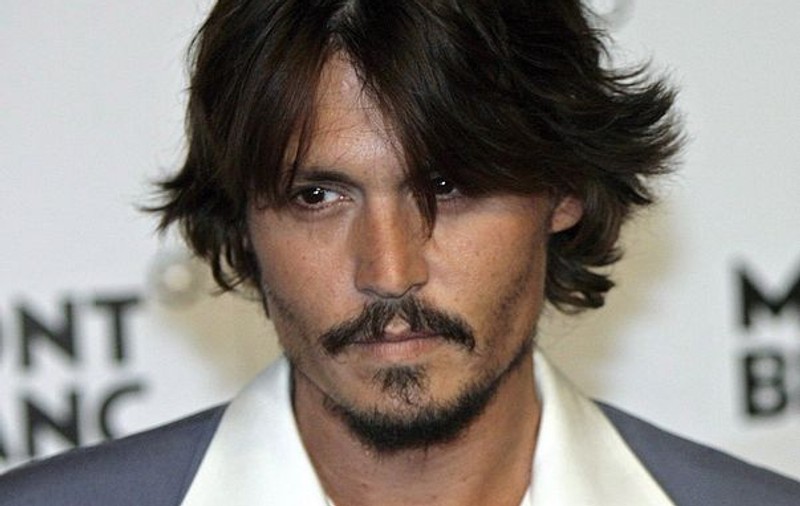 Johnny Depp, dat în judecată pentru agresiune