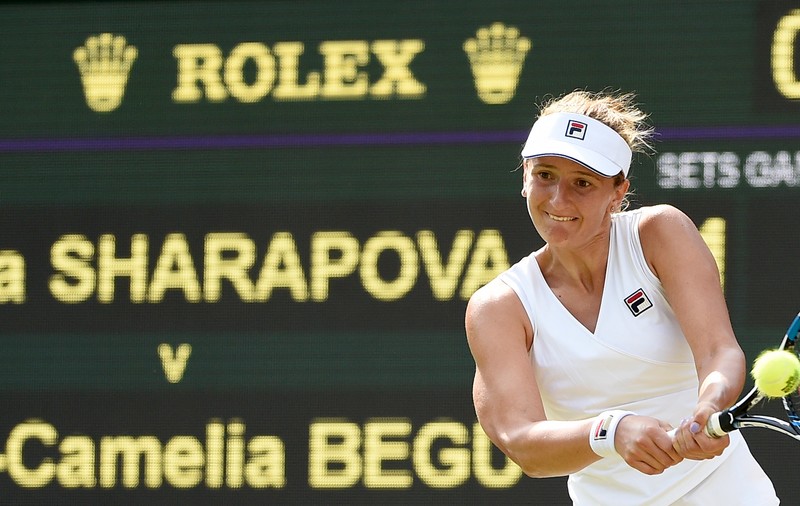 Irina Begu, învinsă de către Maria Șarapova într-o oră și 23 de minute, în turul 3 la Wimbledon. ^La dublu, Florin Mergea și Horia Tecău s-au calificat în ”optimi”