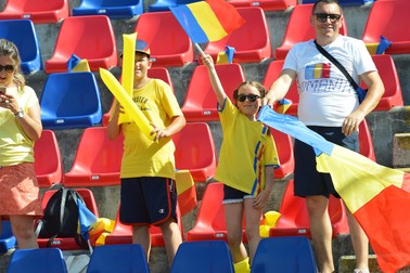 epa07677739 Romanian fans cheer during the UEFA European Under-21 Championship 2019 semi final soccer match between Germany and Romania in Bologna, Italy, 27 June 2019. EPA-EFE/RENATO OLIMPIO