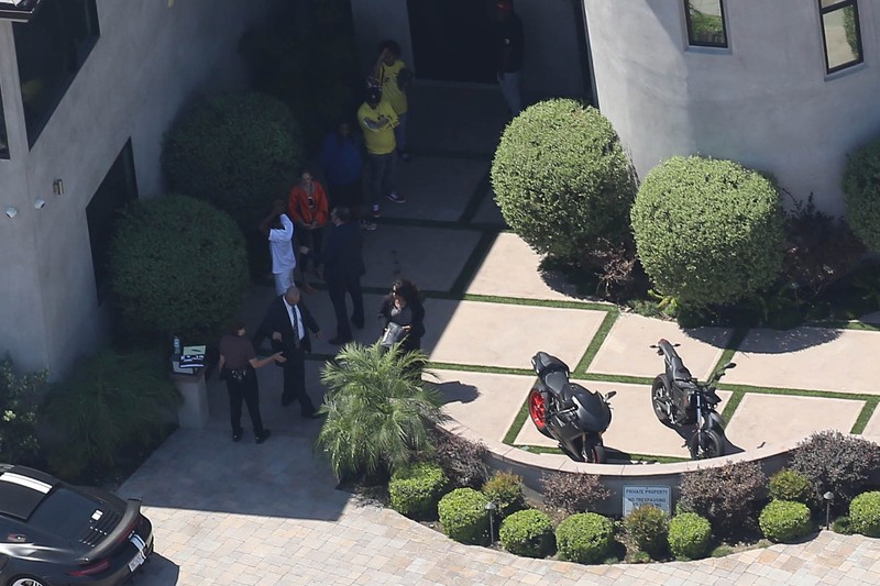 Tarzana, CA - Los Angeles police are seeking a search warrant for singer Chris BrownÄôs Tarzana home to look for a weapon he allegedly used to threaten a woman early Tuesday morning, according to law enforcement sources. Officers responded to a womanÄôs call for help at the residence in the 5000 block of Corbin Avenue about 3 a.m. Tuesday, said LAPD Officer Liliana Preciado. The woman said Brown pointed a gun at her during a violent rage before she ran outside to call police, according to police sources who were not authorized to speak publicly about the case. There are reports that Chris Brown turned in a bag filled with weapons and drugs. A group of Chris Brown's friends were detained by the LAPD for questioning regarding the incident just outside his home. AKM-GSI August 30, 2016 To License These Photos, Please Contact : Maria Buda (917) 242-1505 mbuda@akmgsi.com sales@akmgsi.com or Mark Satter (317) 691-9592 msatter@akmgsi.com sales@akmgsi.com www.akmgsi.com August 30, 2016