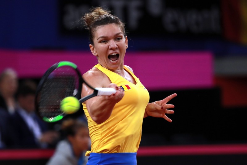 epa07517404  Simona Halep of Romania in action during her game against Kristina Mladenovic of France during the Fed Cup World Group, Semi Final between France and Romania, in Rouen, France, 20 April 2019 EPA-EFE/CHRISTOPHE PETIT TESSON