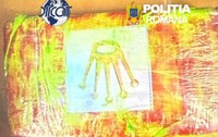 Imagine pe care scrie DIICOT și Poliția Română. De asemenea, apare și un pachet