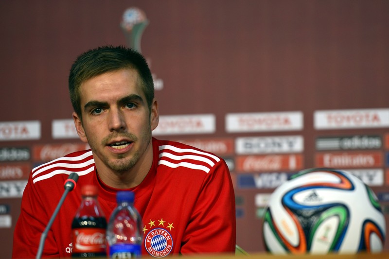 epa03997315 FC Bayern Munich?s captain Philip Lahm talks during a press conference in Marrakech, Morocco, 20 December 2013. FC Bayern Munich will face Raja Casablanca at the final soccer match of the FIFA Club World Cup 2013 on 21 December 2013. EPA/YAHYA ARHAB