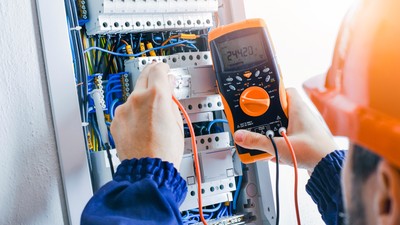 Electrician,Installing,Electric,Cable,Wires,And,Fuse,Switch,Box.,Multimeter