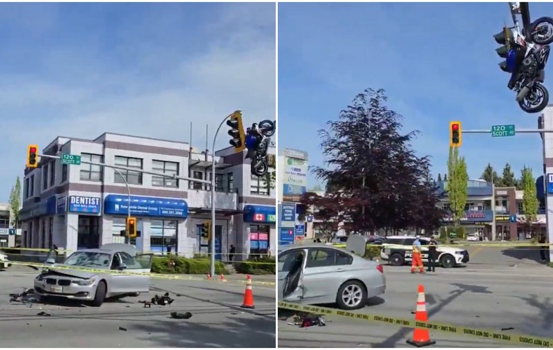 Momentul în care o motocicletă rămâne suspendată de un semafor, după ce s-a izbit de o mașină și a zburat pe deasupra ei, în Canada