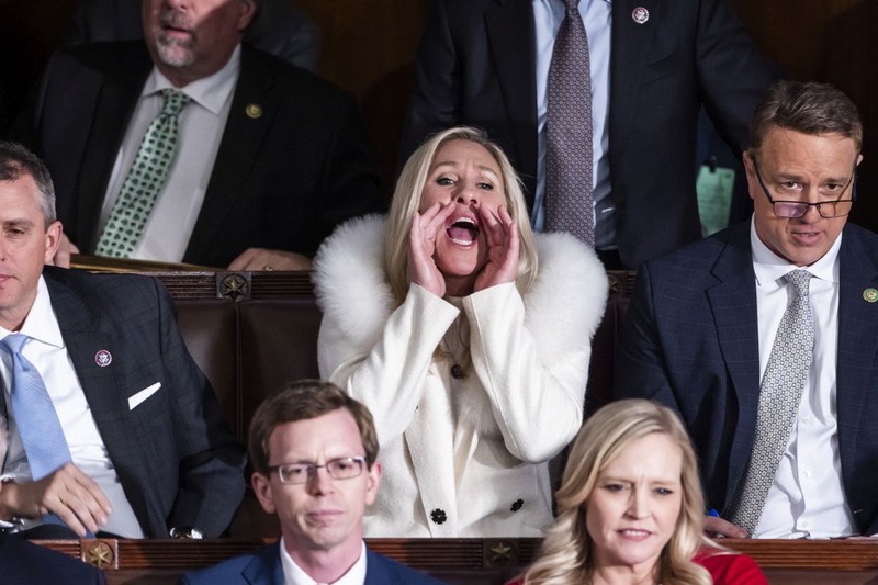 epaselect epa10453727 Republican Representative from Georgia Marjorie Taylor Greene shouts 'liar' as US President Joe Biden delivers his State of the Union address before a joint session of Congress in the United States House of Representatives chamber of the US Capitol in Washington, DC, USA 07 February 2023. EPA-EFE/JIM LO SCALZO