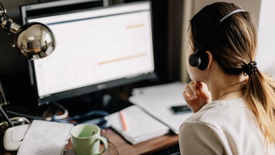 Young,Woman,Working,In,An,Online,Call,Center,Arranged,In