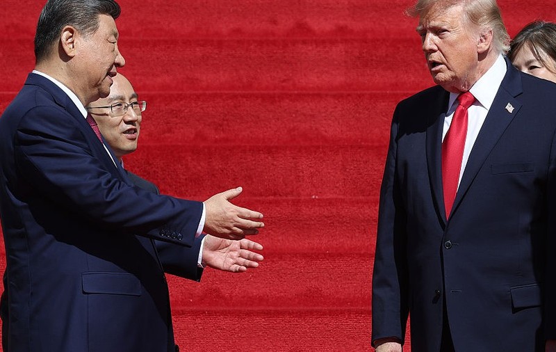 Xi Jinping (stânga) și Donald Trump, surprinși în timp ce discută la Arhivele Naționale ale SUA Sursa foto: Getty Images