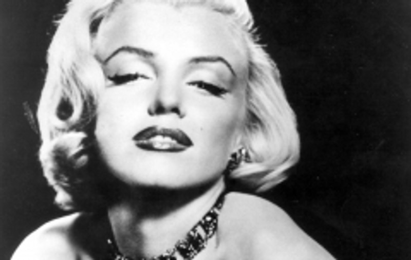 Singura fotografie cu Marilyn Monroe şi fraţii Kennedy, scoasă la licitaţie
