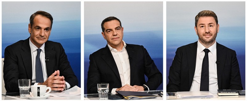 (COMBO) (From top L to R) This combination of picture created on May 11, 2023 shows portraits of Greek Prime Minister and leader of right wing party New Democracy, Kyriakos Mitsotakis, Greek opposition leader of left-wing Syriza party's, Alexis Tsipras, leader of the Socialist party PASOK Nikos Androulakis attending a televised debate in Athens on May 10, 2023 ahead of Greece's general elections on May 21. Greece will hold a legislative election on May 21, 2023, that promises to be the closest in more than a decade, with three main parties competing for seats in the 300-member parliament. Outgoing prime minister Kyriakos Mitsotakis of conservative New Democracy, former premier Alexis Tsipras of leftist Syriza and ex-European lawmaker Nikos Androulakis of the Socialists are aiming to lead their parties to victory.,Image: 776053604, License: Rights-managed, Restrictions: TO GO WITH AFP STORY by John HADOULIS, Model Release: no