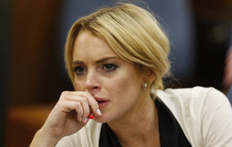 Lindsay Lohan păzită non-stop în închisoare, de teamă să nu se sinucidă