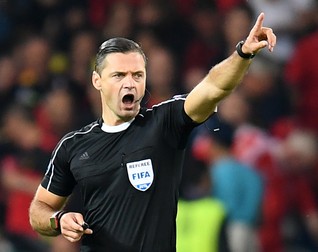 epa05402208 Slovenian referee Damir Skomina gestures during the UEFA EURO 2016 quarter final match between Wales and Belgium at Stade Pierre Mauroy in Lille Metropole, France, 01 July 2016. (RESTRICTIONS APPLY: For editorial news reporting purposes only. Not used for commercial or marketing purposes without prior written approval of UEFA. Images must appear as still images and must not emulate match action video footage. Photographs published in online publications (whether via the Internet or otherwise) shall have an interval of at least 20 seconds between the posting.) EPA/GEORGI LICOVSKI EDITORIAL USE ONLY