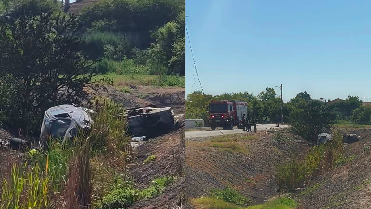 Doua masini rasturnate in sant, dintre care una de politie// o masina de pompieri pe marginea santului unde 2 masini s-au rasturnat