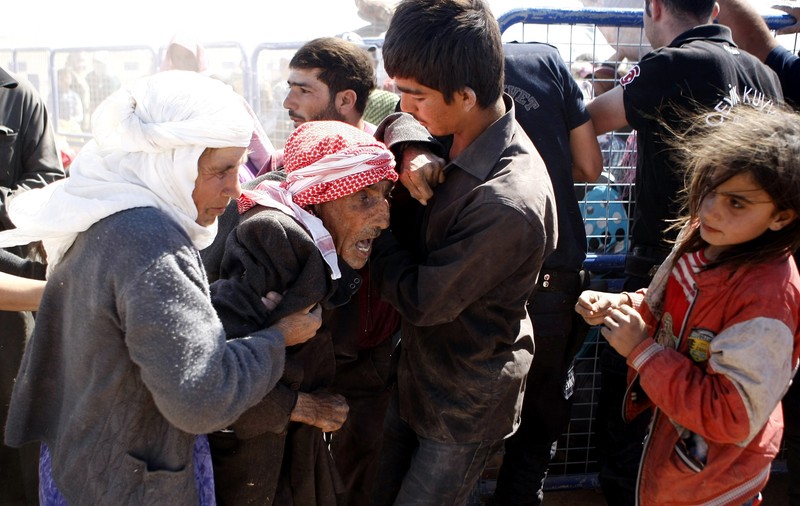 Germania va prelua lunar sute de migranți blocați în Italia