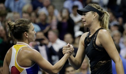 epa06169517 Maria Sharapova of Russia (R) and Simona Halep of Romania at the net after their match on the first day of the US Open Tennis Championships at the USTA National Tennis Center in Flushing Meadows, New York, USA, 28 August 2017. The US Open runs through September 10. EPA-EFE/PETER FOLEY