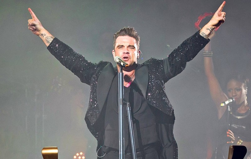 Robbie Williams aterizează la fițe!