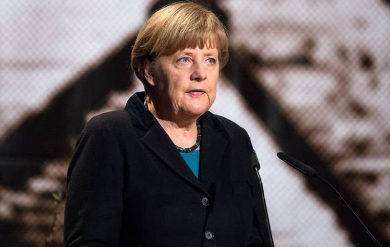 Angela Merkel exclude o REDUCERE a DATORIEI GRECIEI