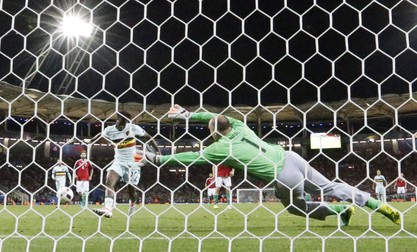 epa05393303 Michy Batshuayi of Belgium beats goalkeeper Gabor Kiraly of Hungary to give his team the 2-0 lead during the UEFA EURO 2016 round of 16 match between Hungary and Belgium at Stade Municipal in Toulouse, France, 26 June 2016. (RESTRICTIONS APPLY: For editorial news reporting purposes only. Not used for commercial or marketing purposes without prior written approval of UEFA. Images must appear as still images and must not emulate match action video footage. Photographs published in online publications (whether via the Internet or otherwise) shall have an interval of at least 20 seconds between the posting.) EPA/VASSIL DONEV EDITORIAL USE ONLY