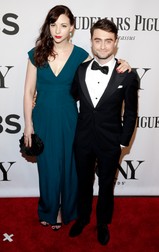 epa04245899 Actor Daniel Radcliff (R), of the United Kingdom, poses with girlfriend, actress Erin Darke, of the US, on the red carpet at the 2014 Tony Awards at Radio City Music Hall in New York, New York, USA, 08 June 2014. The annual awards honor excellence in Broadway theatre. EPA/JASON SZENES