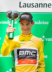 epa05937077 The winner of the 71th Tour de Romandie Richie Porte from Australia of team BMC Racing celebrates on the podium during the fifth and last stage, a 17,88 km race against the clock, at the 71th Tour de Romandie UCI ProTour cycling race in Lausanne, Switzerland, 30 April 2017. EPA/JEAN-CHRISTOPHE BOTT
